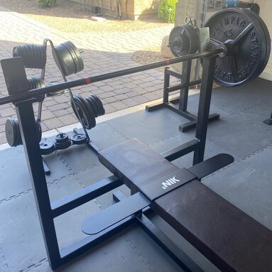 Weight Bench With Barbell in Gym