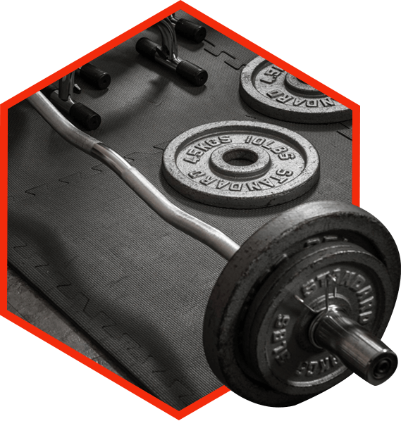 Weights and Barbell on a Gym Mat